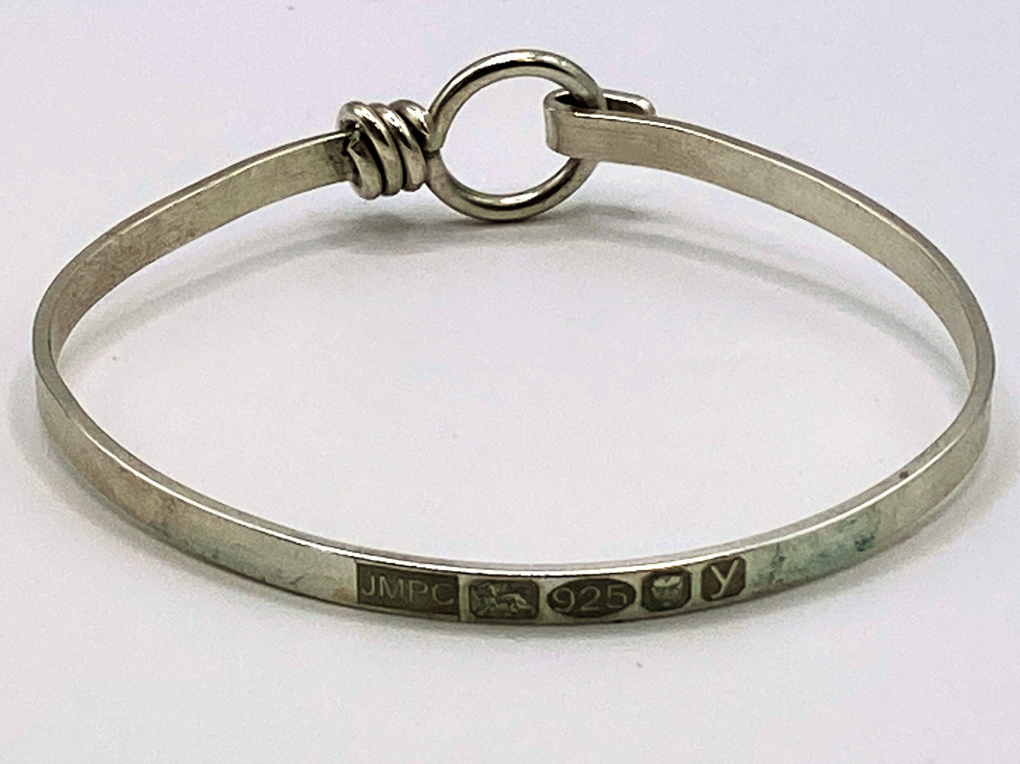 forged hallmarked silver sterling bracelet with band and ring design