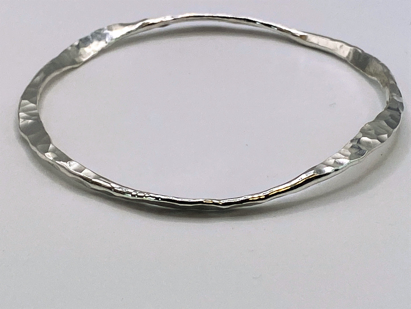 Hand forged hallmarked silver sterling bangles