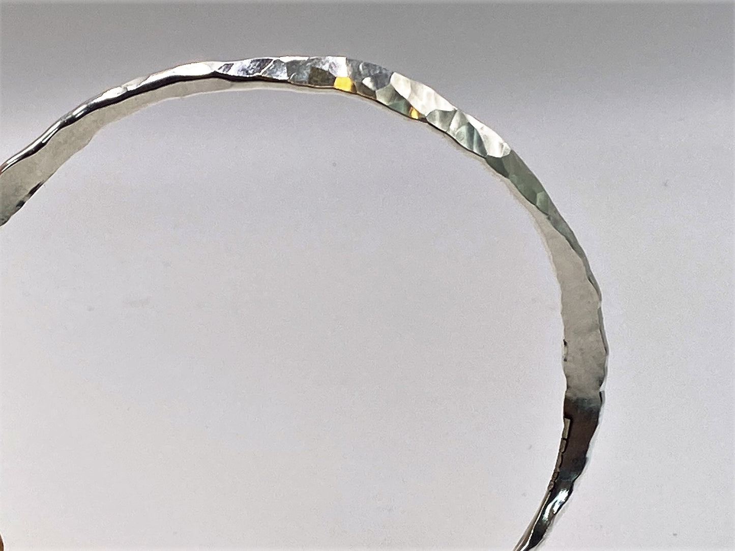 Hand forged hallmarked silver sterling bangles