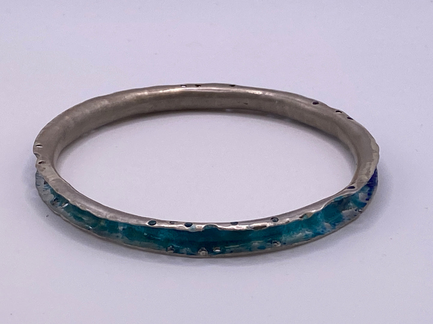 Enamelled in blue and turquoise Forged u shaped section bangle