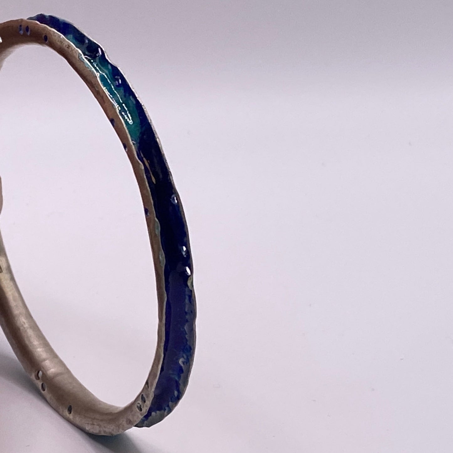 Enamelled in blue and turquoise Forged u shaped section bangle