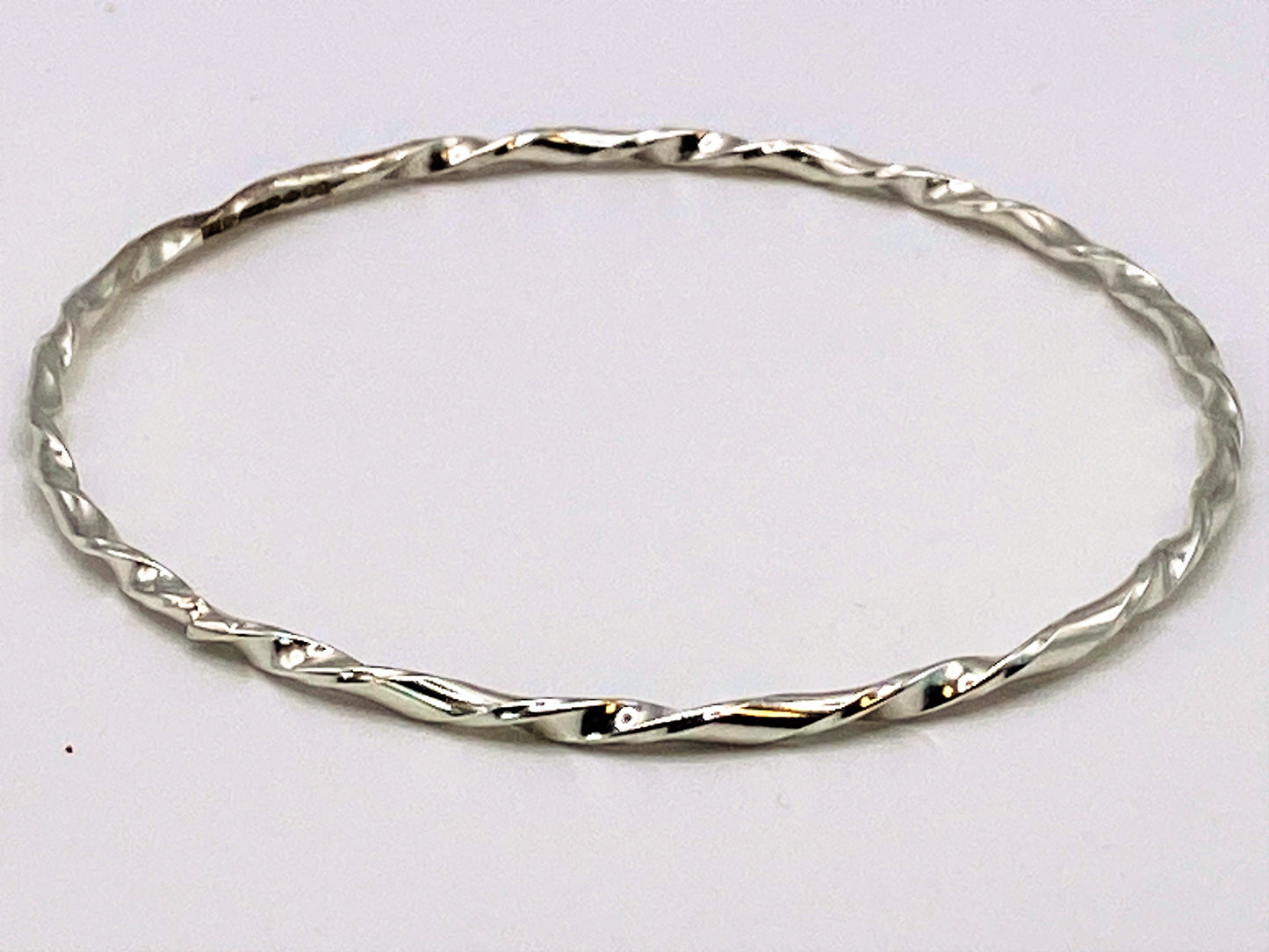 Hand made twisted D section hallmarked silver sterling bangles