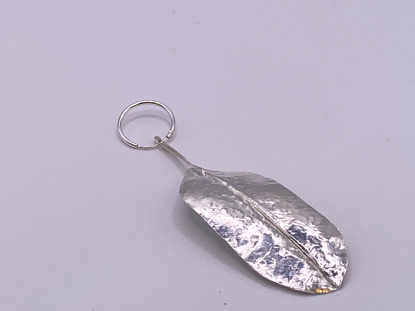 Hand forged hallmarked silver sterling feather pendant